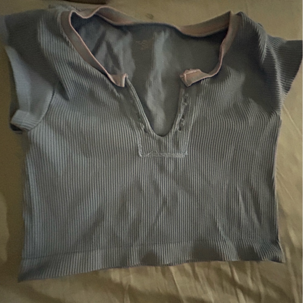This is a Urban Outfitters cropped tee. It is barely worn.
